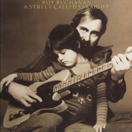 Album cover for Roy Buchanan's A Street Called Straight, showing a man embracing a child who plays an electric guitar.