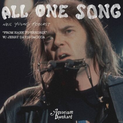 Close-up of a man (Neil Young) singing into a microphone on a poster for a Neil Young podcast, with large text 'ALL ONE SONG' and credits: 'NEIL YOUNG PODCAST' 'FROM HANK TO HENDRIX' W/ JERRY DAVID DeCICCA, and 'Archive Drunkard' at the bottom.